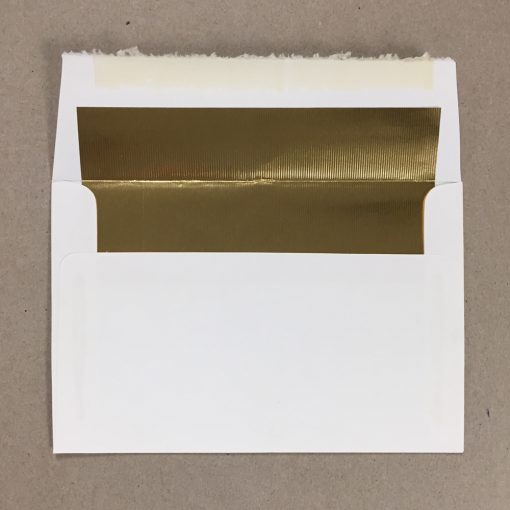 Overstock envelope 5-5/8" x 8-3/8" with deckled edge and fold foil lining in light cream rough textured stock shown with flap open revealing liner.