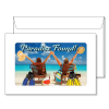 Full-view window envelope shown here front and back with flap folded down. Face side shows window with vacation insert image visible in window. Text overlaying the insert image reads "Paradise Found!" The image depicts a young couple sitting in beach chairs facing the ocean with hands outstretched with one hand each holding a straw hat. Behind the chairs rests two pairs of flippers, a beach ball, and a tote bag.